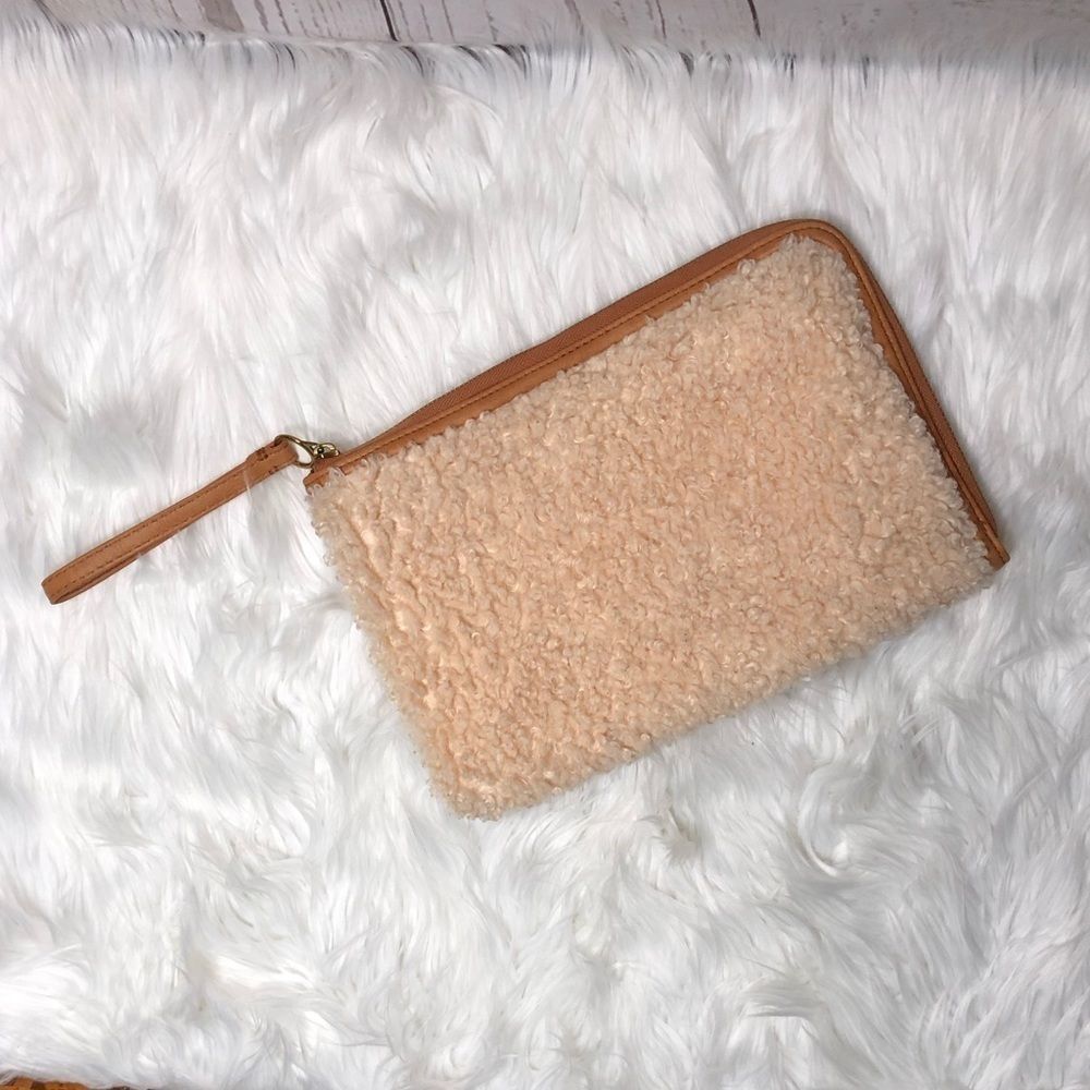Universal Thread fuzzy clutch wristlet